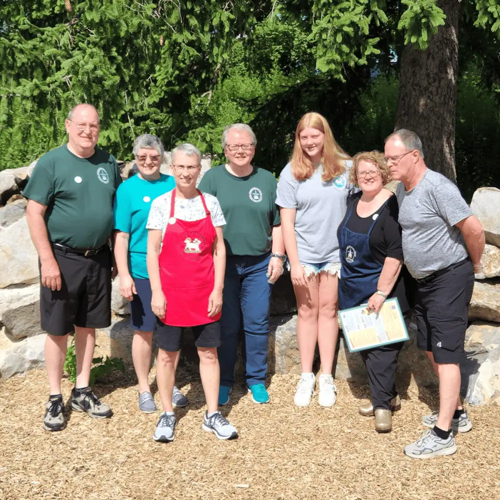 A group of 7 Schoeneckians pose for a picture after a successful church fundraiser at a local restaurant.