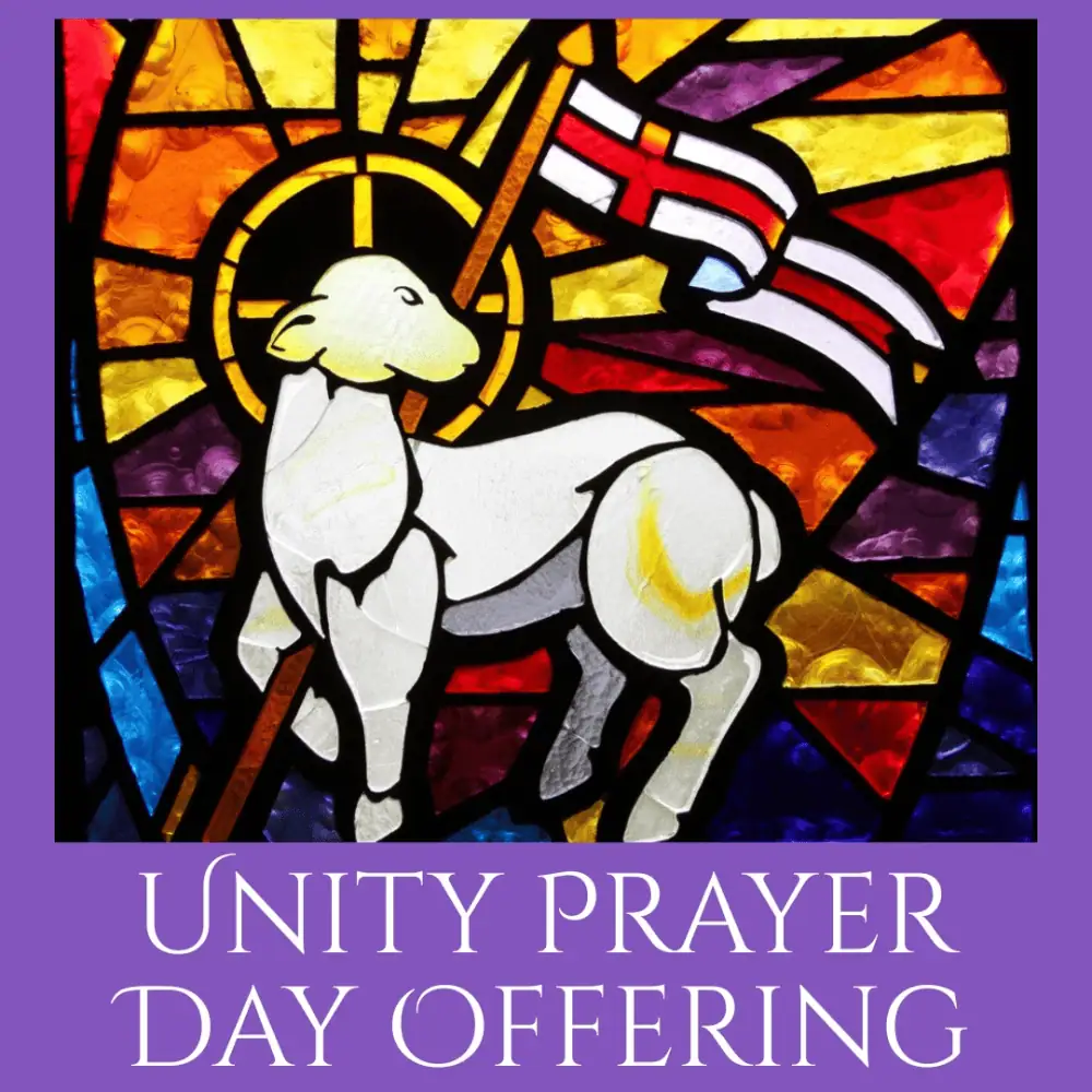 The stained glass Agnus Dei from the Moravian Church in the Netherlands, Zeist is in the center of the image. Around it is a purple box. At the bottom of the box, in white fancy cap lettering are the words "Unity Prayer Day Offering".