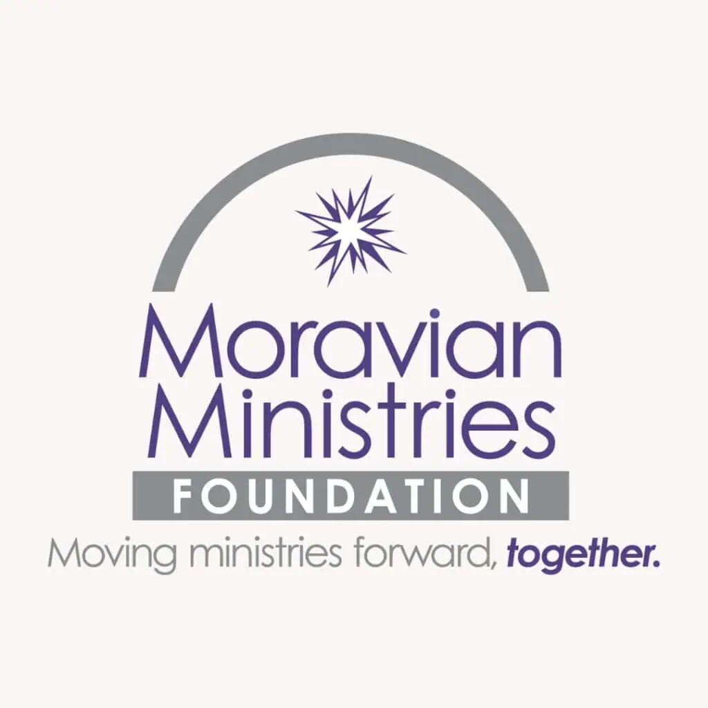 The logo for the Moravian Ministries Foundation. A navy blue and white stylized Moravian Star is under a grey line arch. The words Moravian Ministry are written in a navy sans serif font. The word Foundation is written in white inside a grey box. Underneath are the words: Moving ministries forward, together.